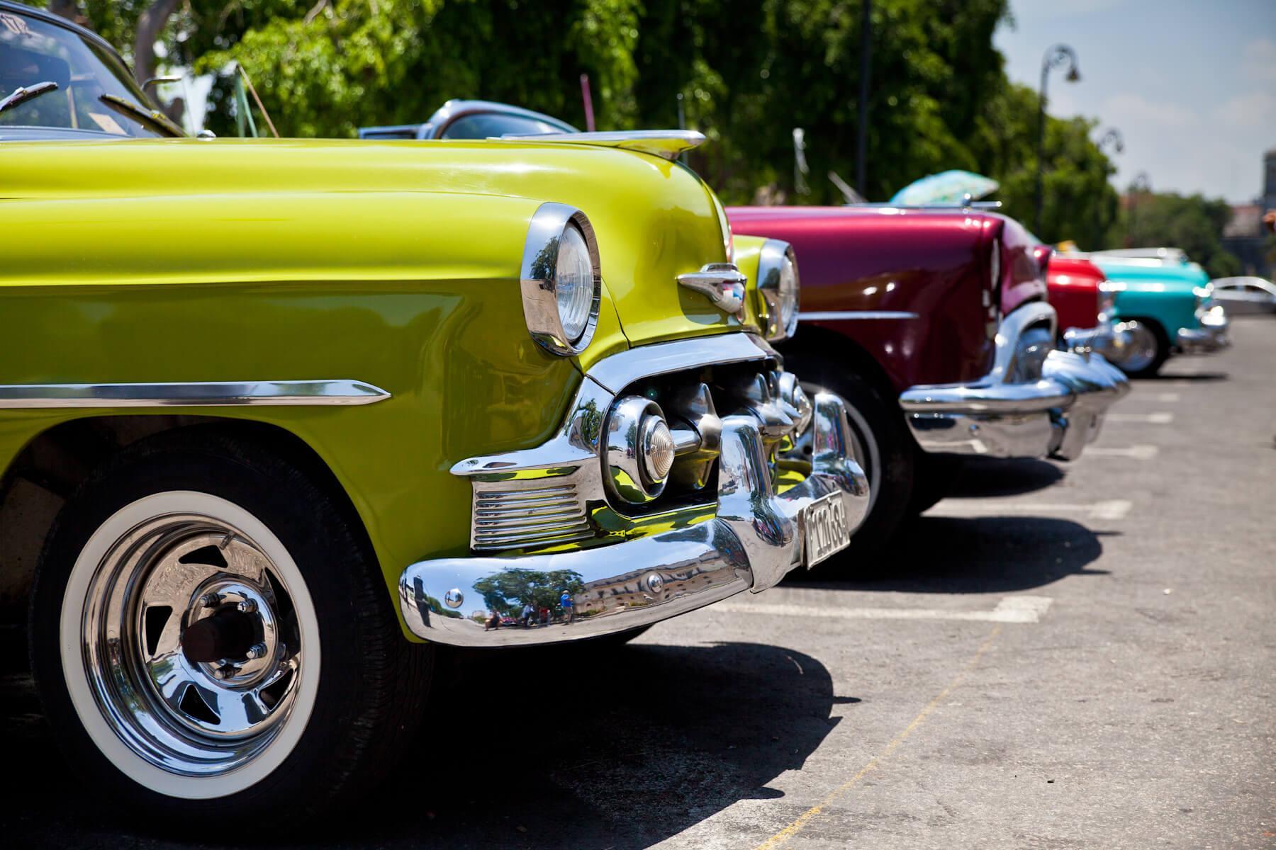 Classic cars line the streets of Havana. © Brian J. Hutchinson